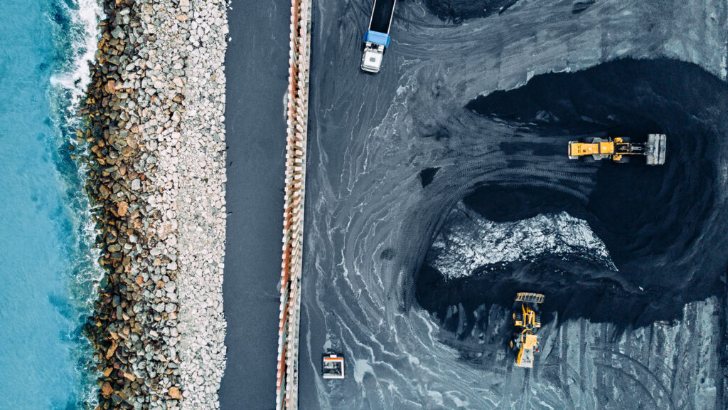 Bird's-eye view of a quarry next to the coast